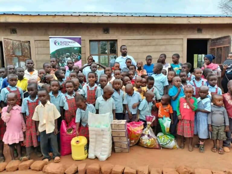 Children sharing a meal at a Super Kids Africa school